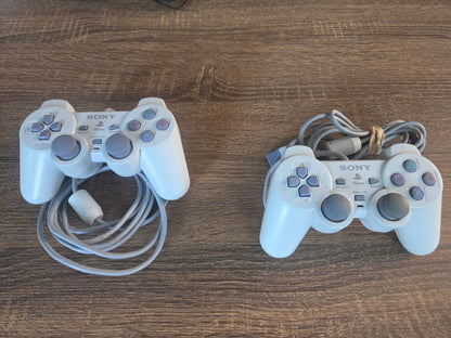 PS1 Slim Bundle w/ 2 Controllers, 2 Games and 1 Memory Card!