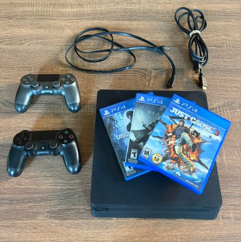 PS4 Bundle w/ 2 Controllers & 3 Games !